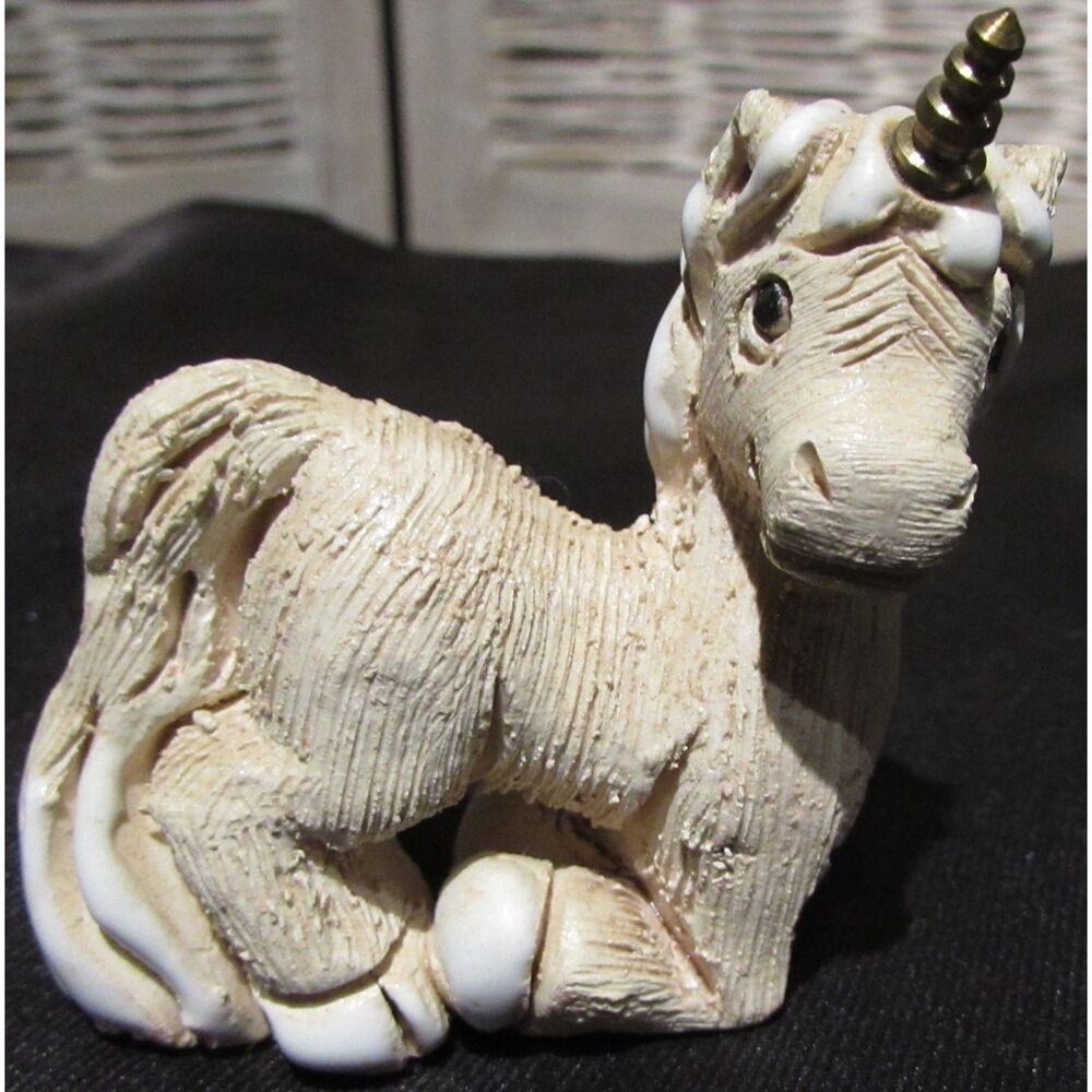 Artesania Rinconada unicorn figurine laying down vintage gold horn